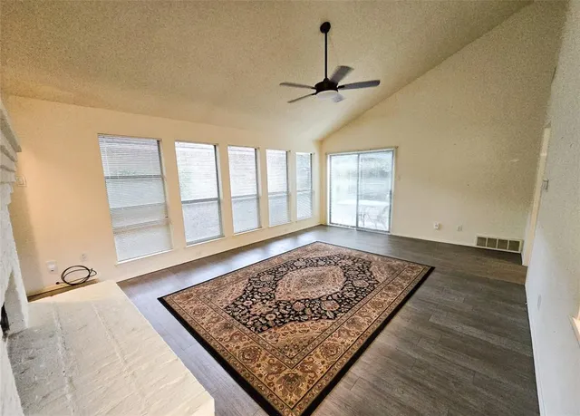 a view of a hallway with windows