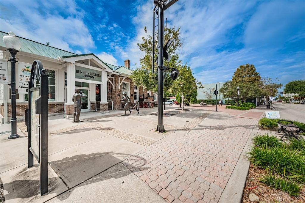 2476 Coronado Way Dunedin, FL 34698 - Photo 61 of 81 a view of a building with a street