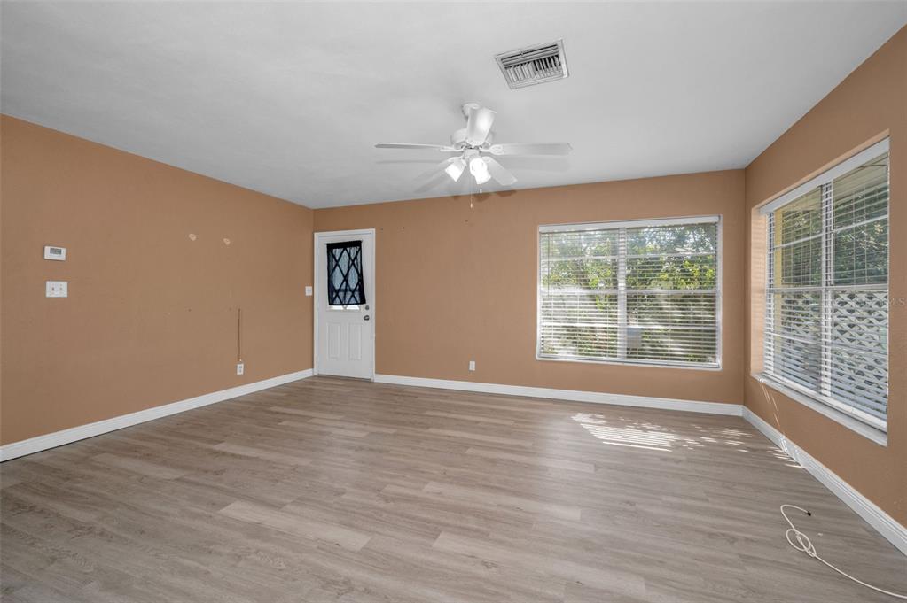 2476 Coronado Way Dunedin, FL 34698 - Photo 7 of 81 a view of an empty room with a window