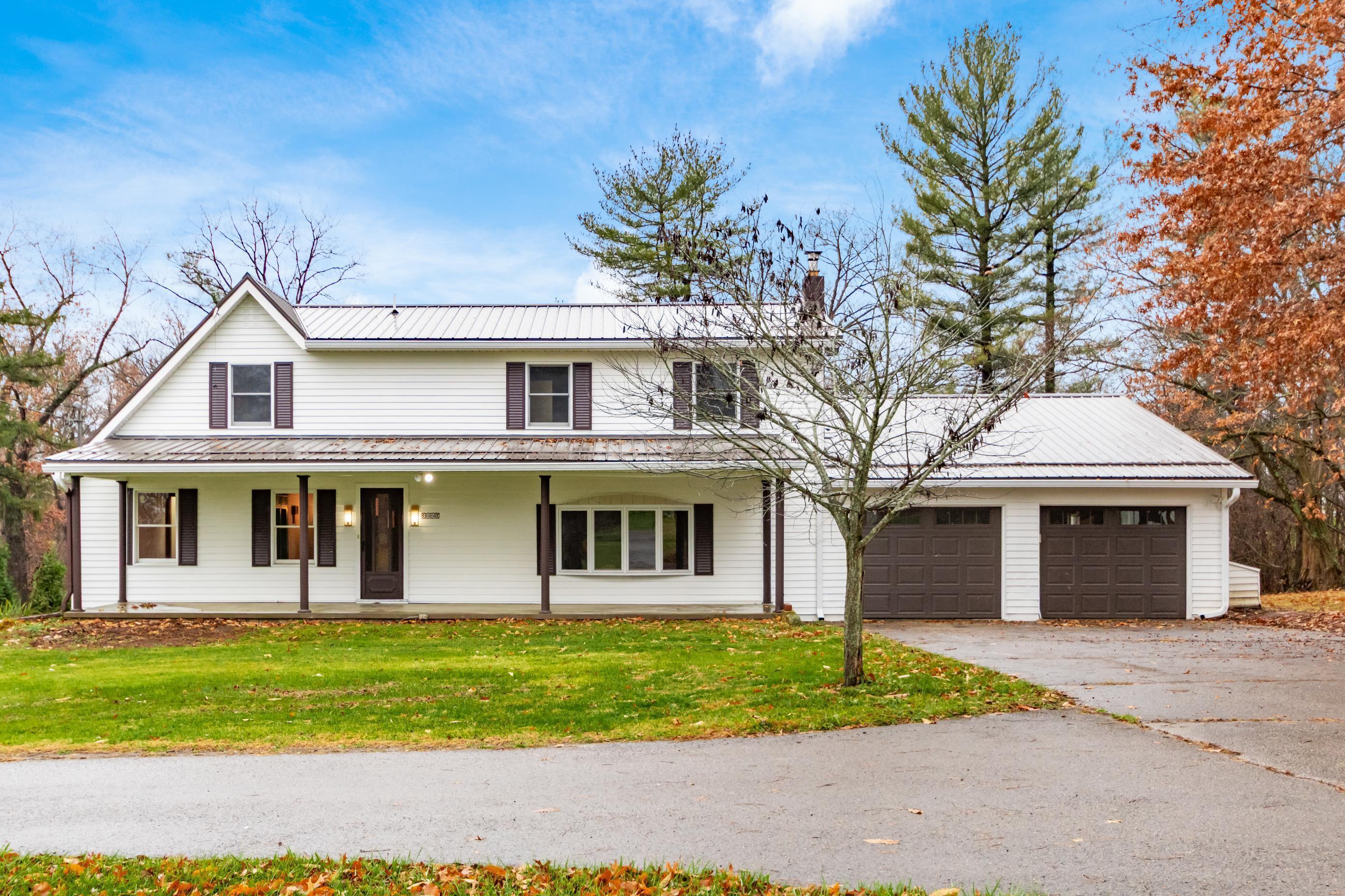 3229 Nolan Road Zanesville, OH 43701 - Photo 1 of 53 Front of the home in the fall