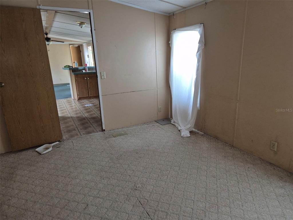 11651 Northeast 73rd Lane Bronson, FL 32621 - Photo 36 of 39 an empty room with windows