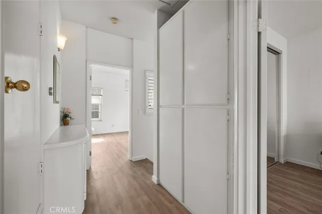 a view of a bathroom with wooden floor