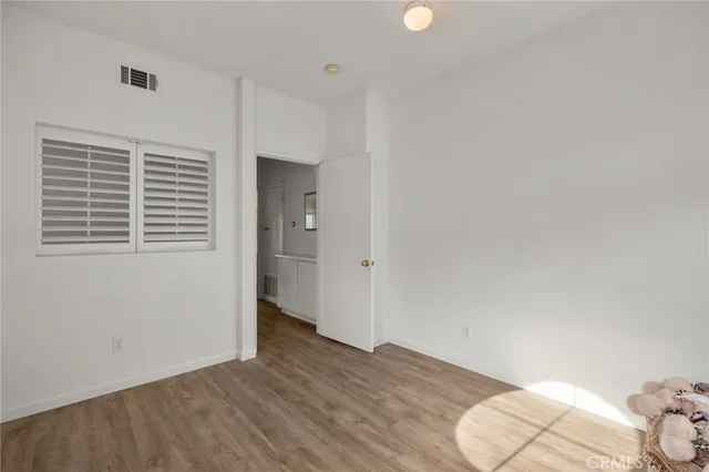 a view of livingroom with hardwood floor and a ceiling fan