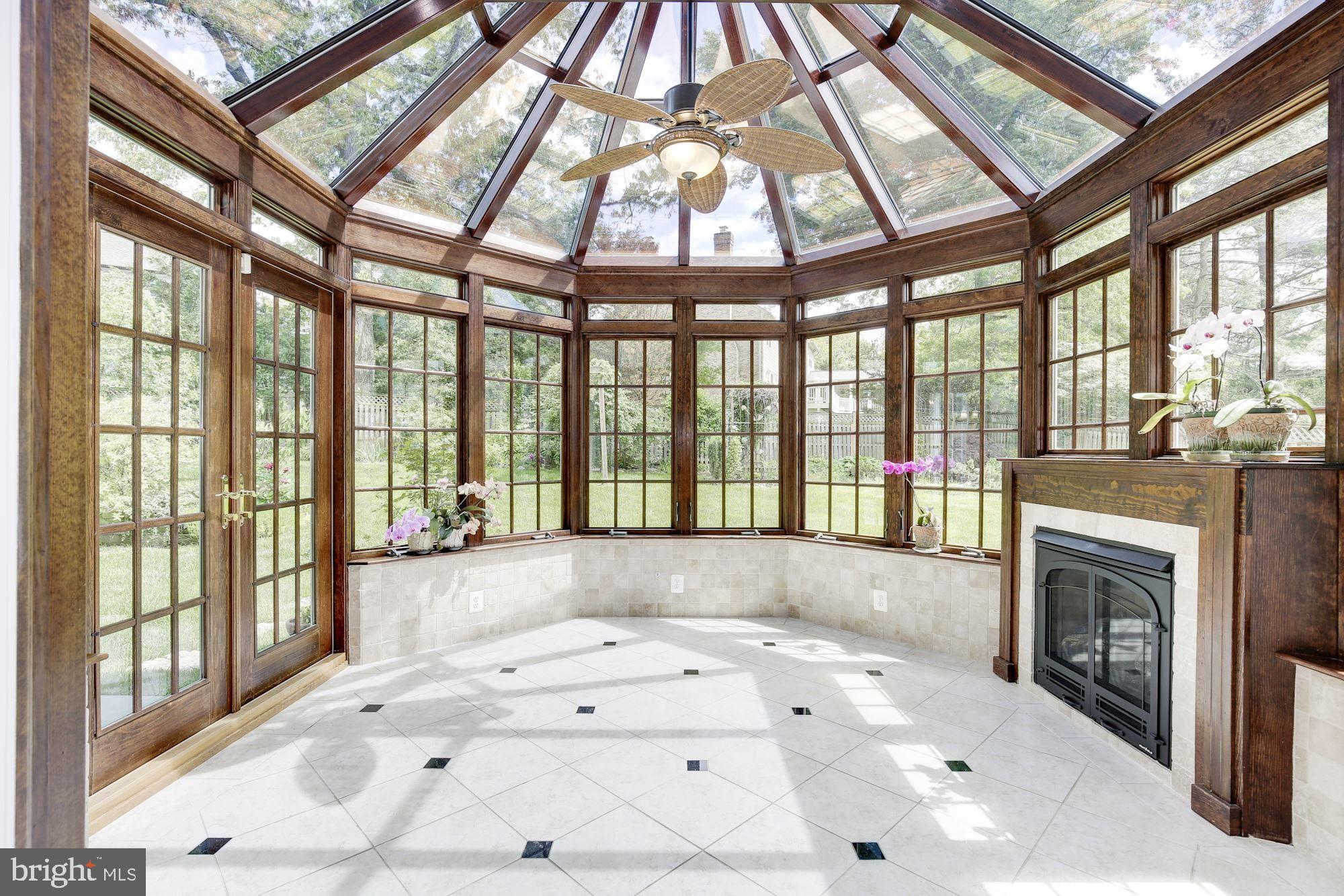 9809 Hall Road Potomac, MD 20854 - Photo 22 of 55 Sun room w French doors to flagstone patio