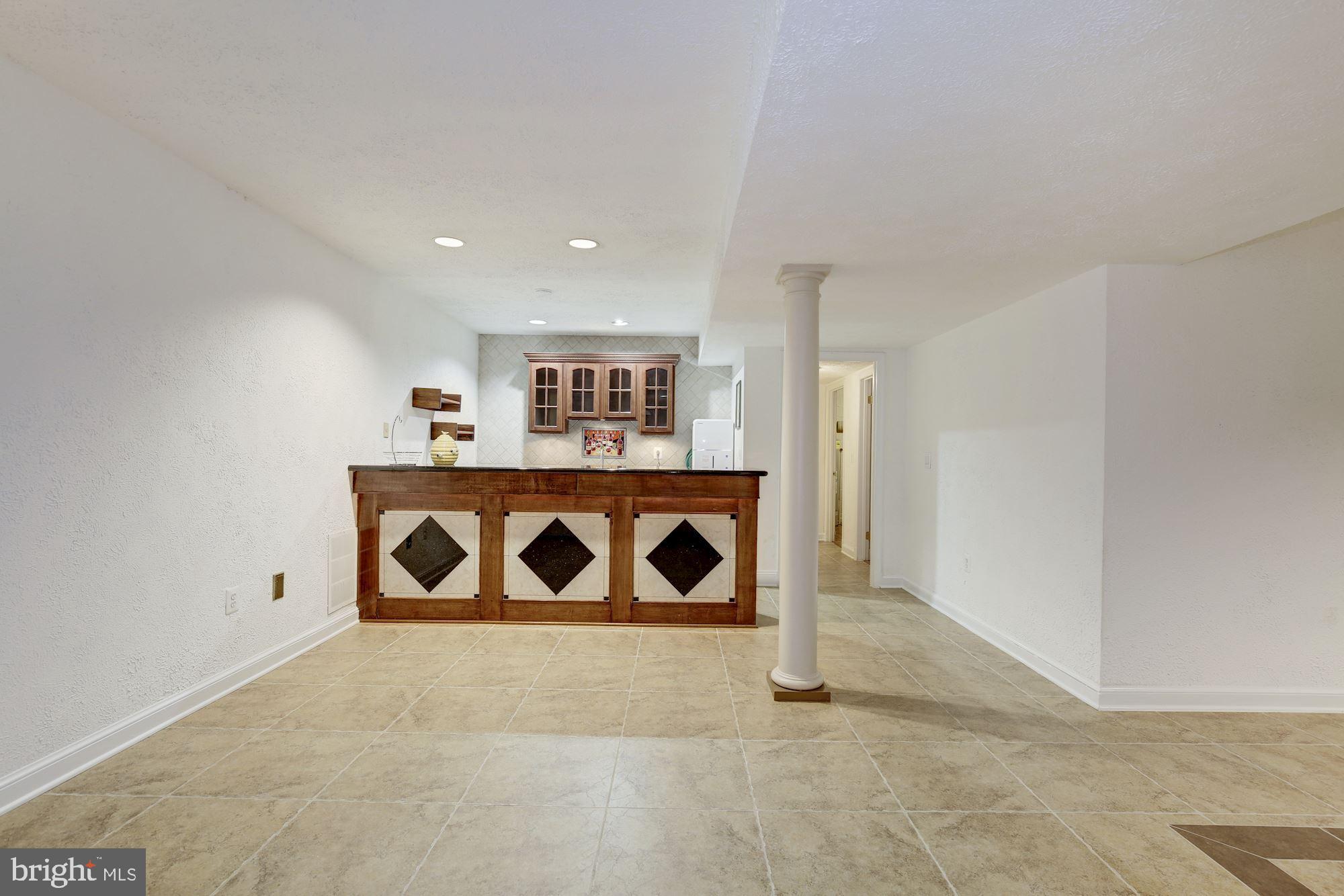 9809 Hall Road Potomac, MD 20854 - Photo 39 of 55 Lower Level wet bar