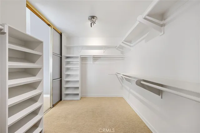 an aerial view of a house with a lake view