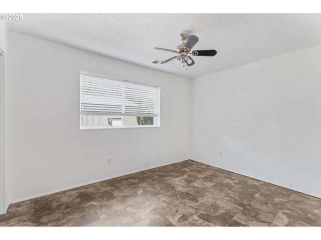 a view of empty room with window