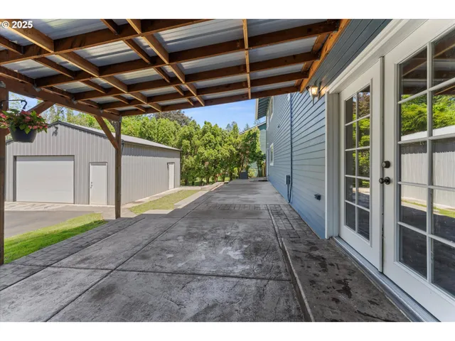 a view of a backyard of the house