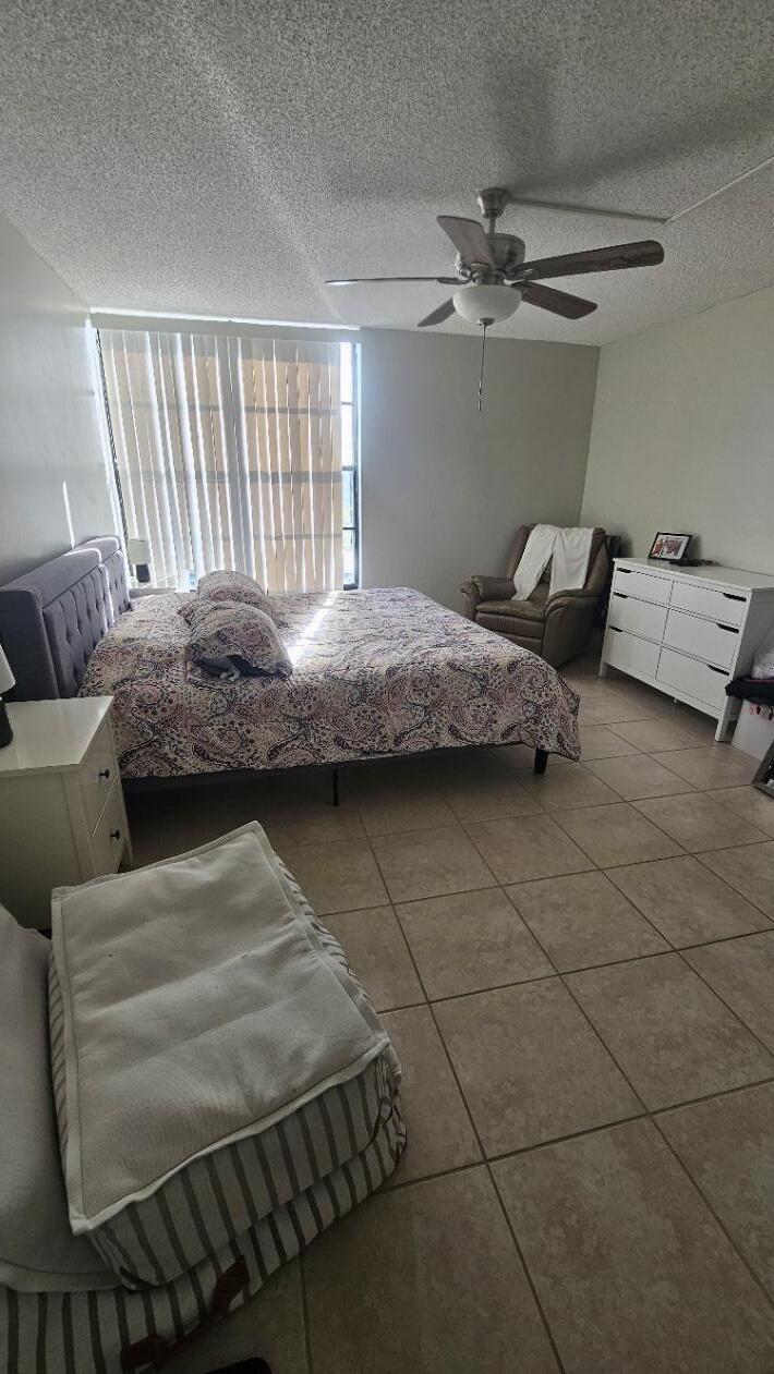 4 Royal Palm Way, Unit 6050 Boca Raton, FL 33432 - Photo 22 of 35 a bedroom with a bed and window