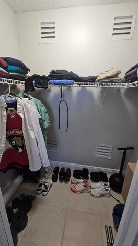 a close view of shoes and chairs in a room