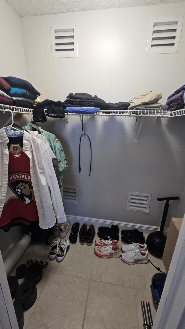 4 Royal Palm Way, Unit 6050 Boca Raton, FL 33432 - Photo 27 of 35 a close view of shoes and chairs in a room