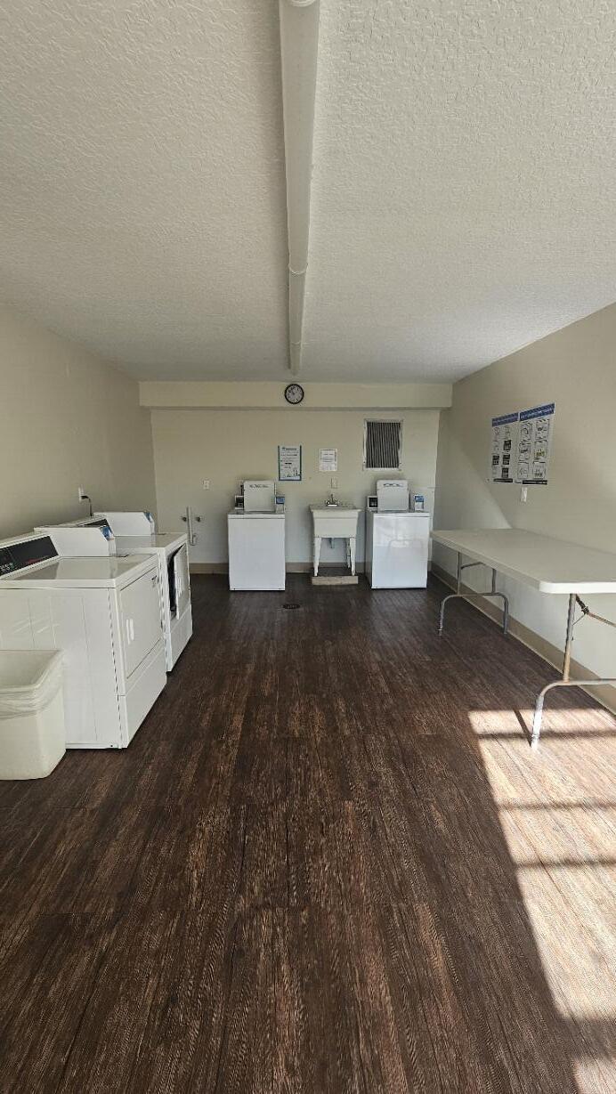 4 Royal Palm Way, Unit 6050 Boca Raton, FL 33432 - Photo 33 of 35 a living room with furniture and a wooden floor