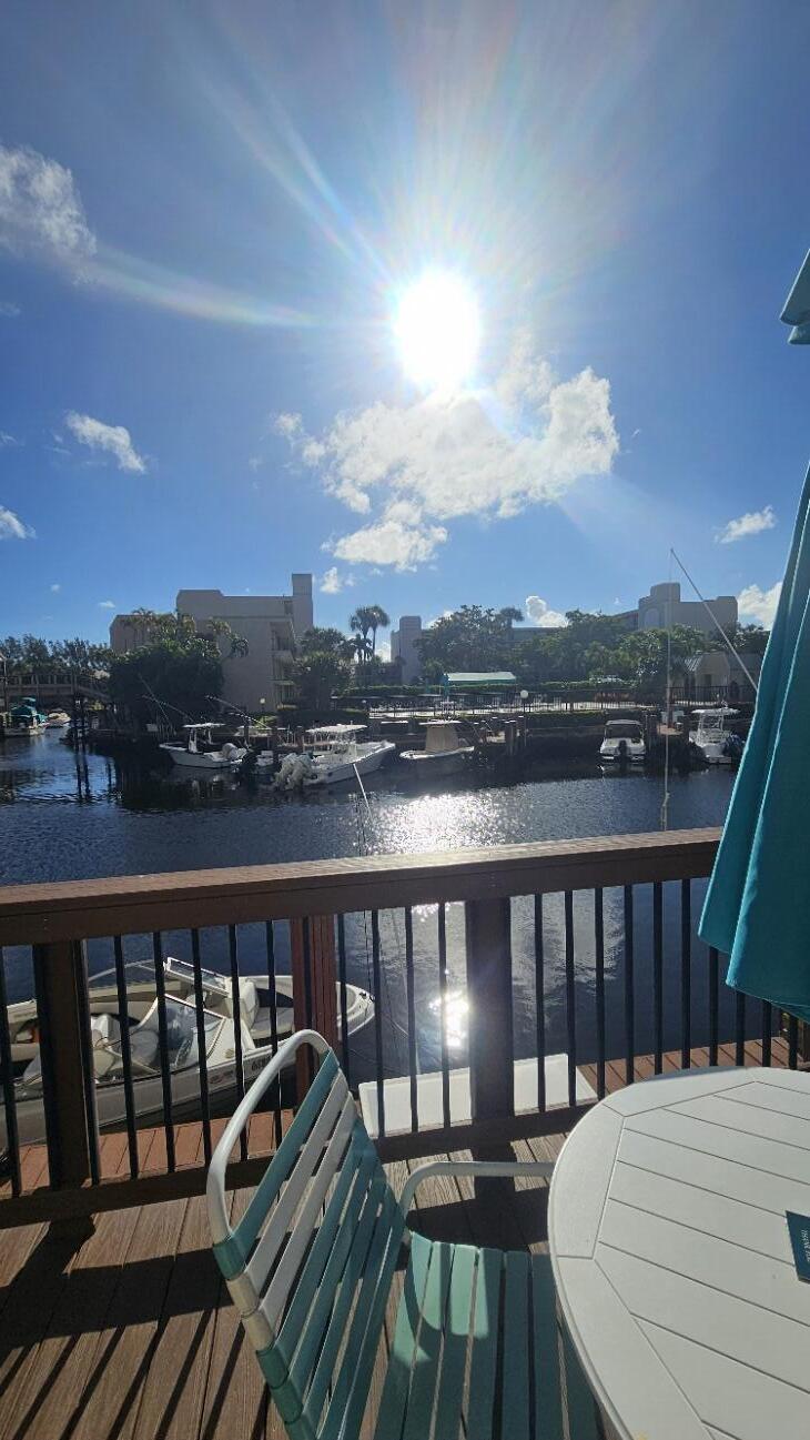 4 Royal Palm Way, Unit 6050 Boca Raton, FL 33432 - Photo 6 of 35 a balcony with wooden floor and city view