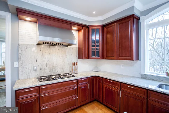 a en suite bathroom with a sink and mirror