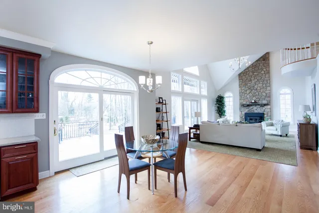 a bed room with a bed and a chandelier