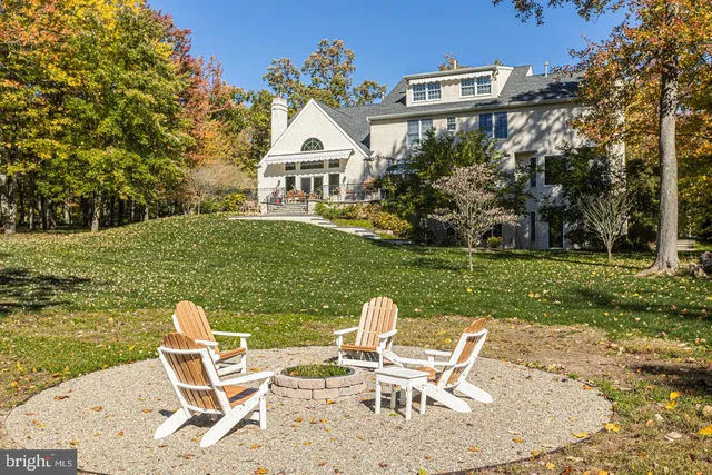 a view of a livingroom with furniture and a table