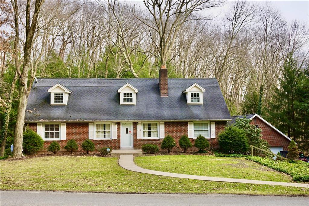 455 Old Plank Road Butler, PA 16002 - Photo 1 of 25 a front view of a house with garden