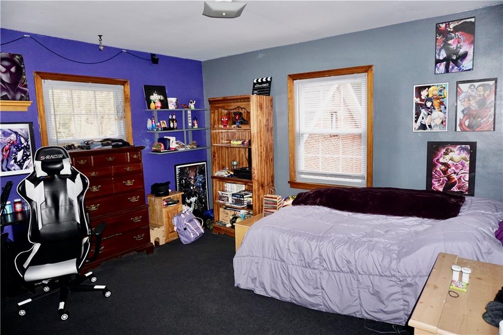 455 Old Plank Road Butler, PA 16002 - Photo 13 of 25 a bedroom with a bed and a window