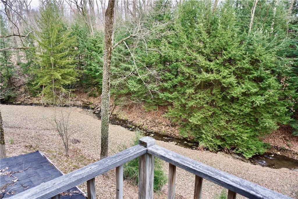 455 Old Plank Road Butler, PA 16002 - Photo 20 of 25 a view of a forest from a balcony