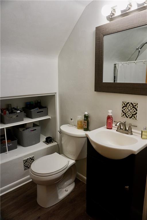 455 Old Plank Road Butler, PA 16002 - Photo 21 of 25 a bathroom with a toilet a sink and mirror