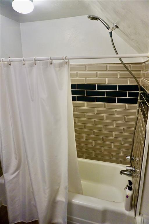 455 Old Plank Road Butler, PA 16002 - Photo 22 of 25 a bathroom with a shower and a tub