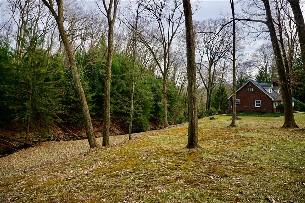 455 Old Plank Road Butler, PA 16002 - Photo 3 of 25 a house with trees in front of it