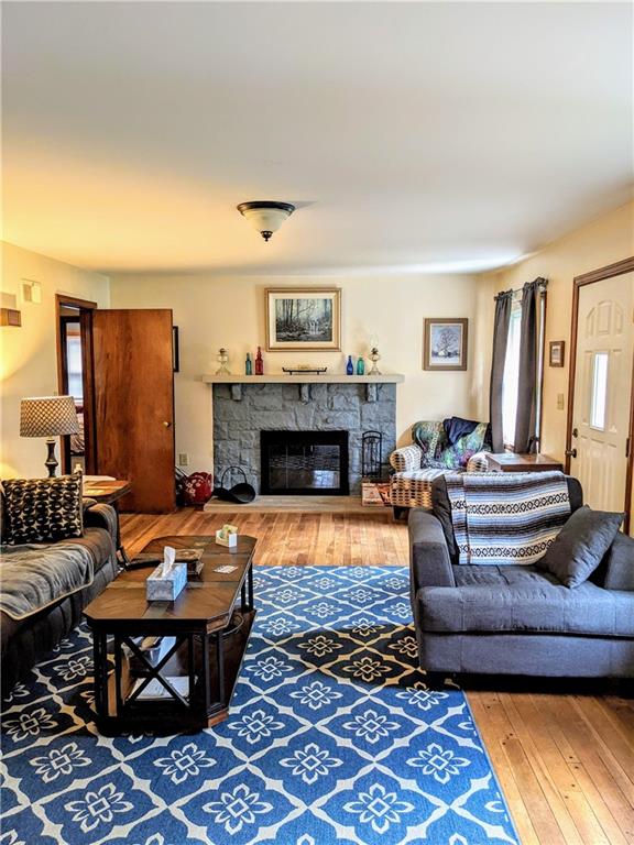 455 Old Plank Road Butler, PA 16002 - Photo 6 of 25 a living room with furniture and a fireplace