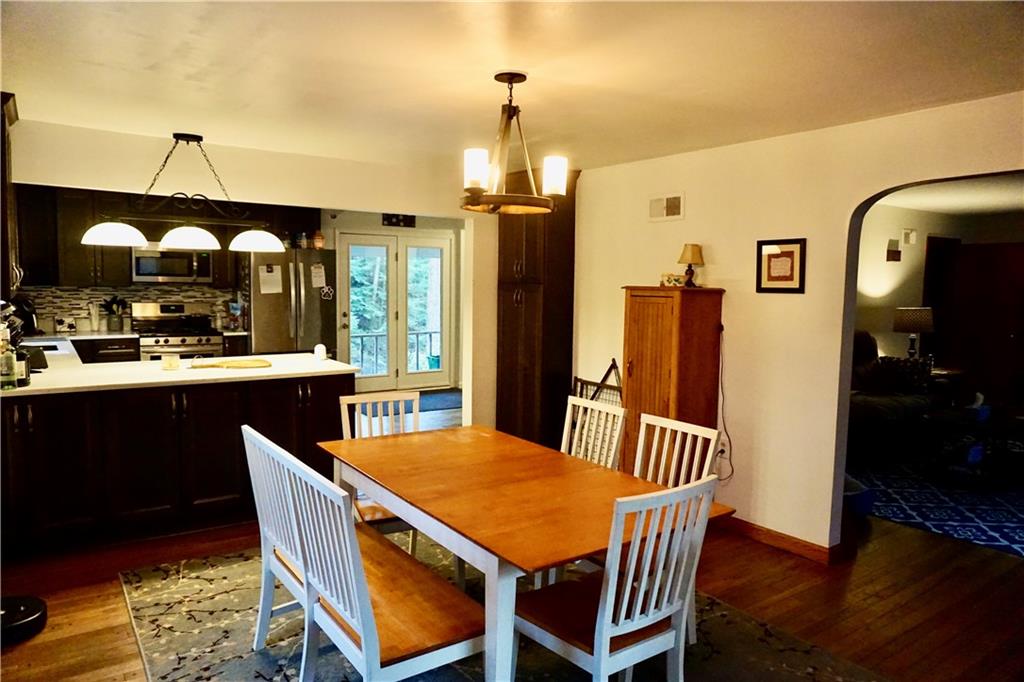 455 Old Plank Road Butler, PA 16002 - Photo 8 of 25 a dining room with furniture a chandelier and wooden floor