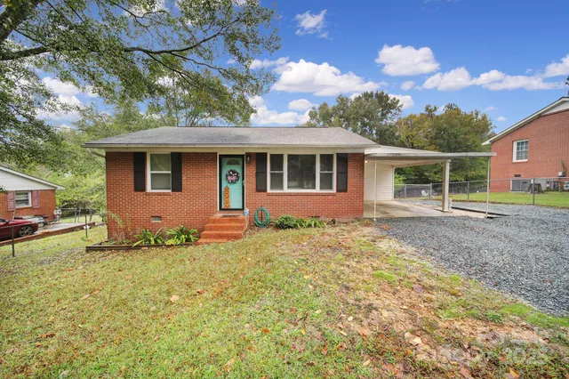 a house view with a garden space