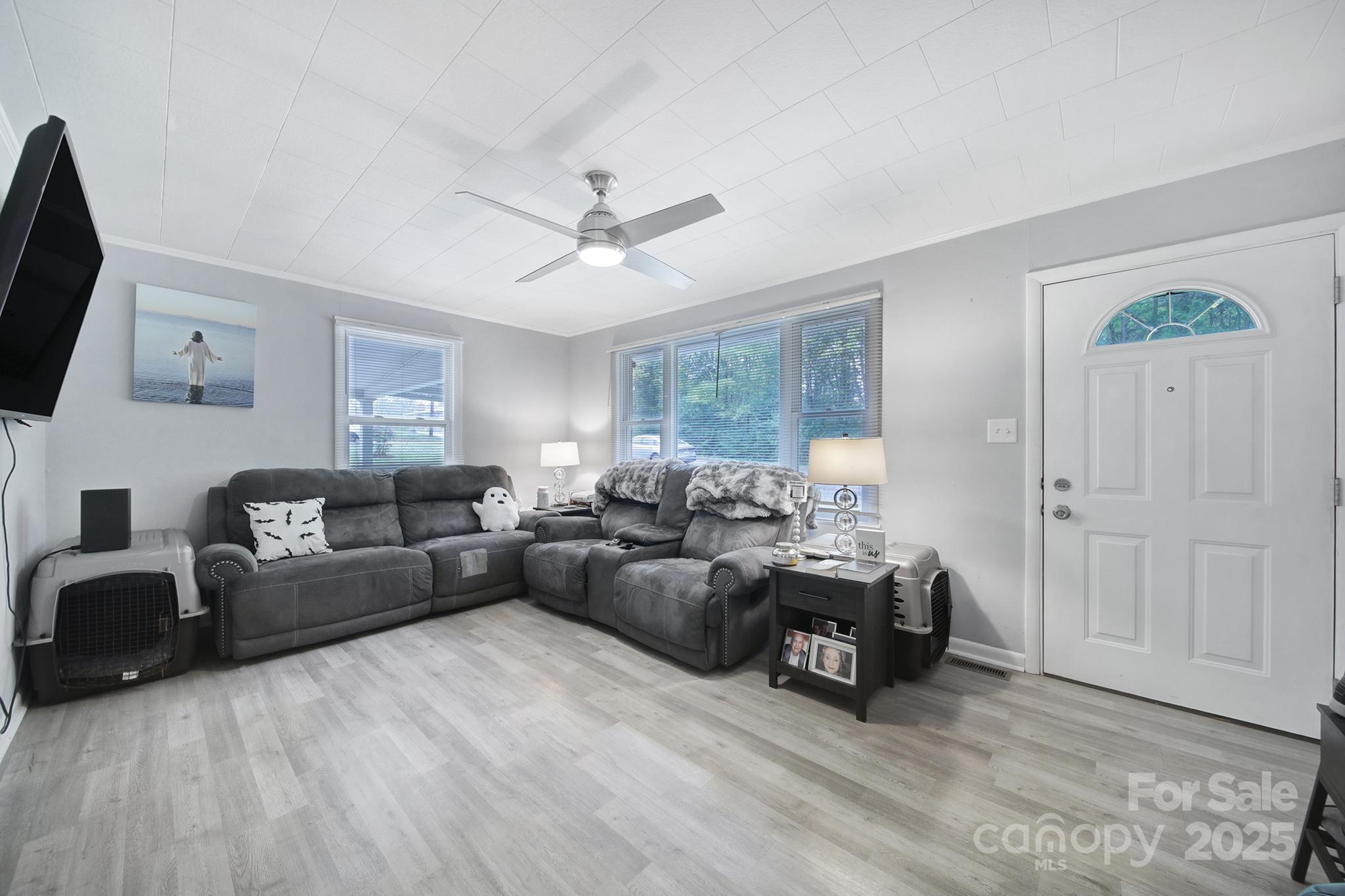 1306 Church Street Lancaster, SC 29720 - Photo 11 of 26 a living room with furniture and a flat screen tv
