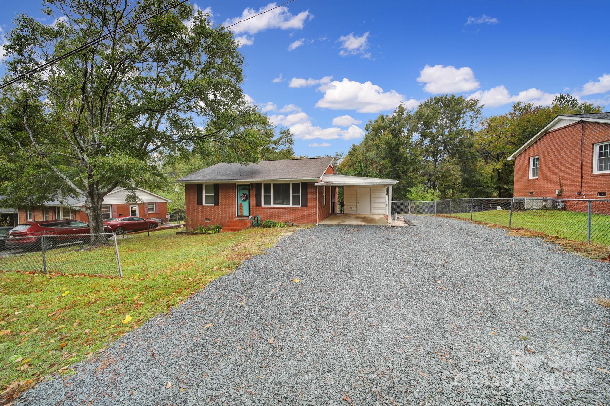 1306 Church Street Lancaster, SC 29720 - Photo 3 of 26 a view of a house with a yard