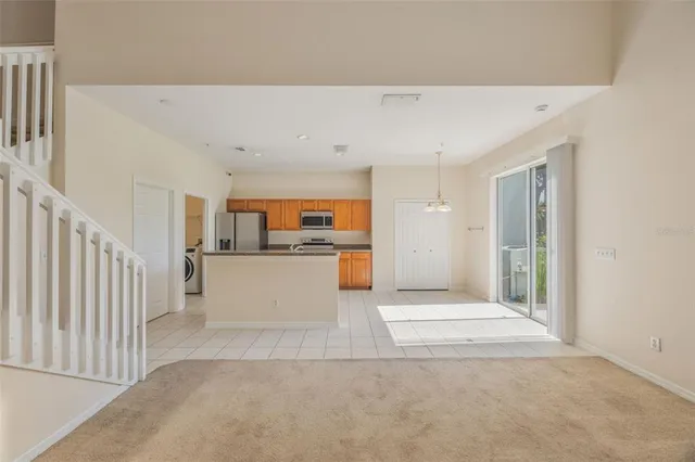 a view of a kitchen with a sink