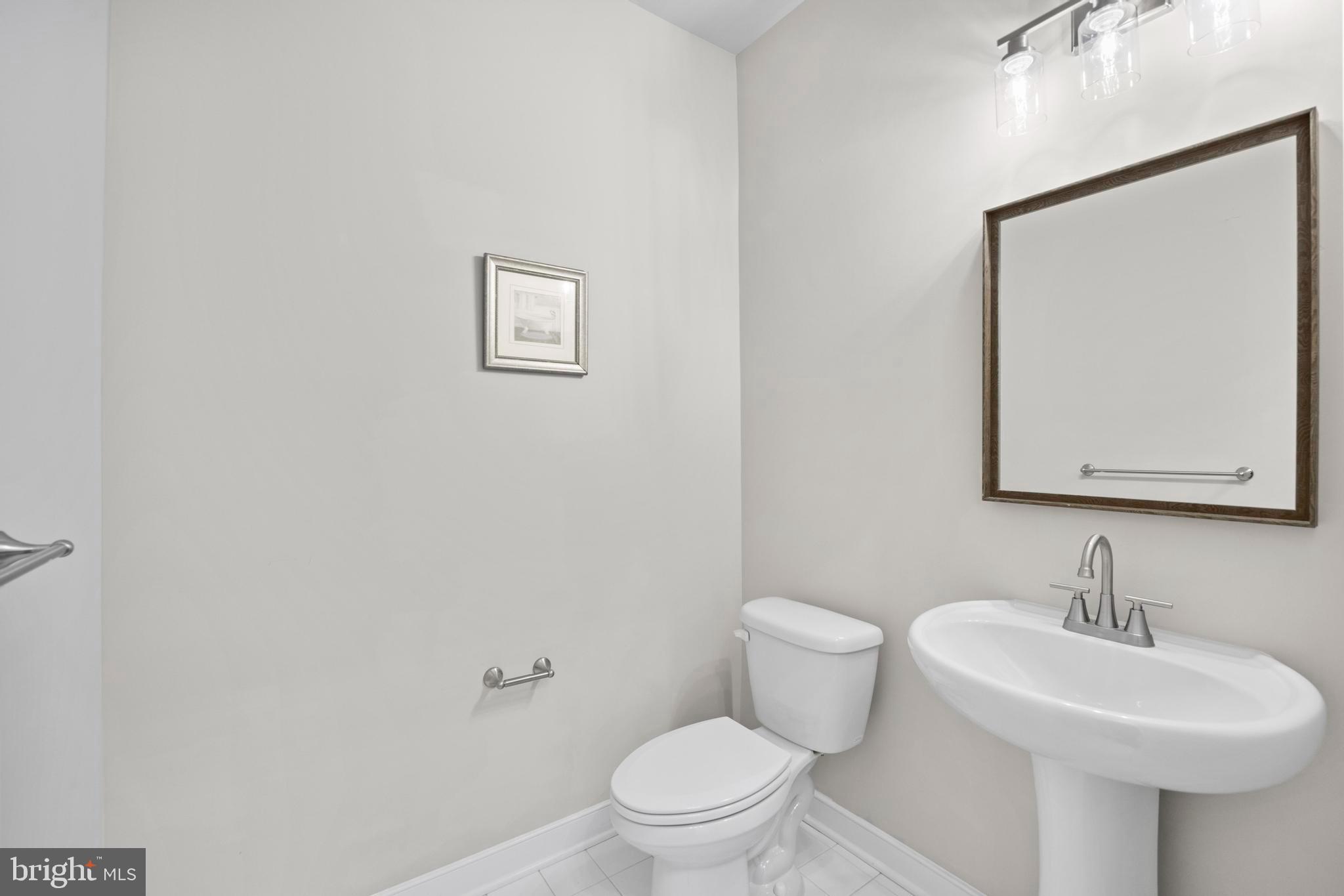 14247 Travilah Road Rockville, MD 20850 - Photo 9 of 95 half bath at 1st level