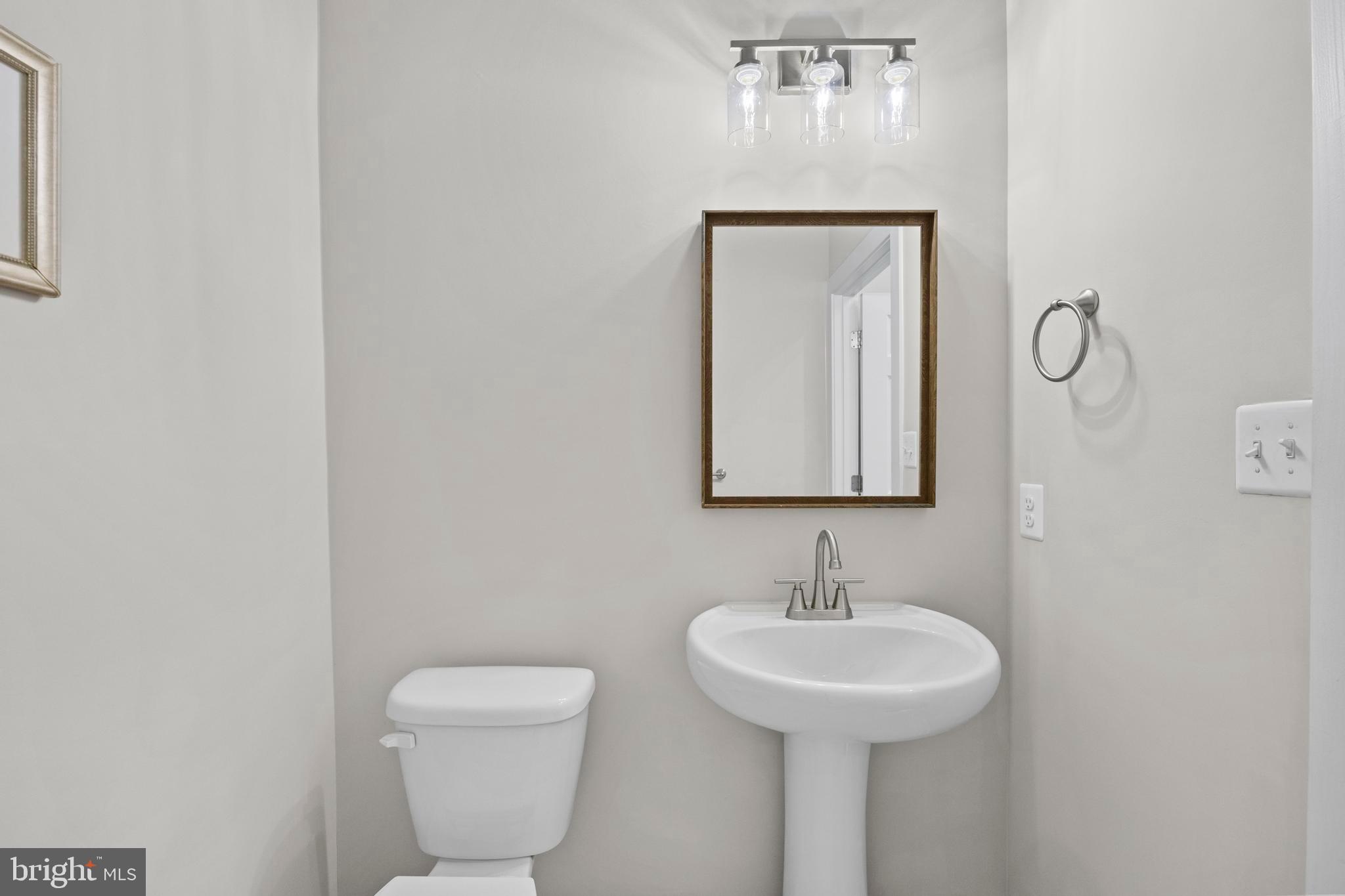 14247 Travilah Road Rockville, MD 20850 - Photo 10 of 95 half bath at 1st level