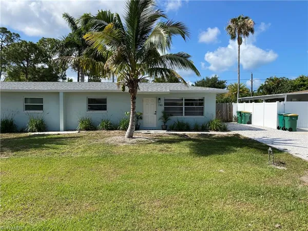 a view of a house with swimming pool