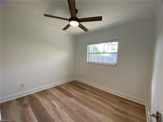 a view of a room that has a window in it