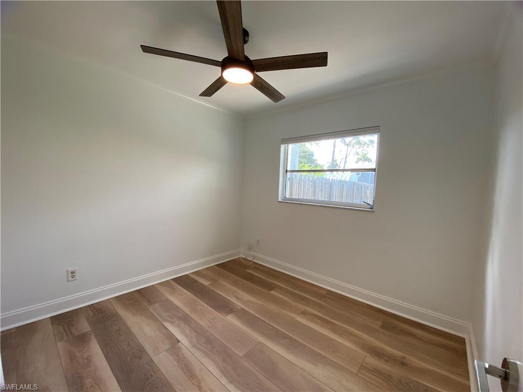 740 108th Avenue North Naples, FL 34108 - Photo 21 of 26 a view of a room that has a window in it