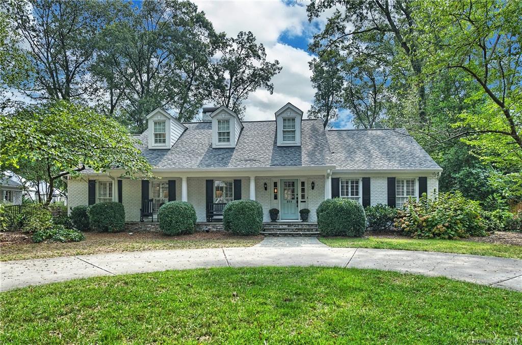 859 Museum Drive Charlotte, NC 28207 - Photo 1 of 23 a front view of a house with a yard