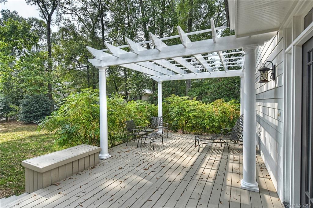 859 Museum Drive Charlotte, NC 28207 - Photo 19 of 23 a view of roof deck with furniture and garden