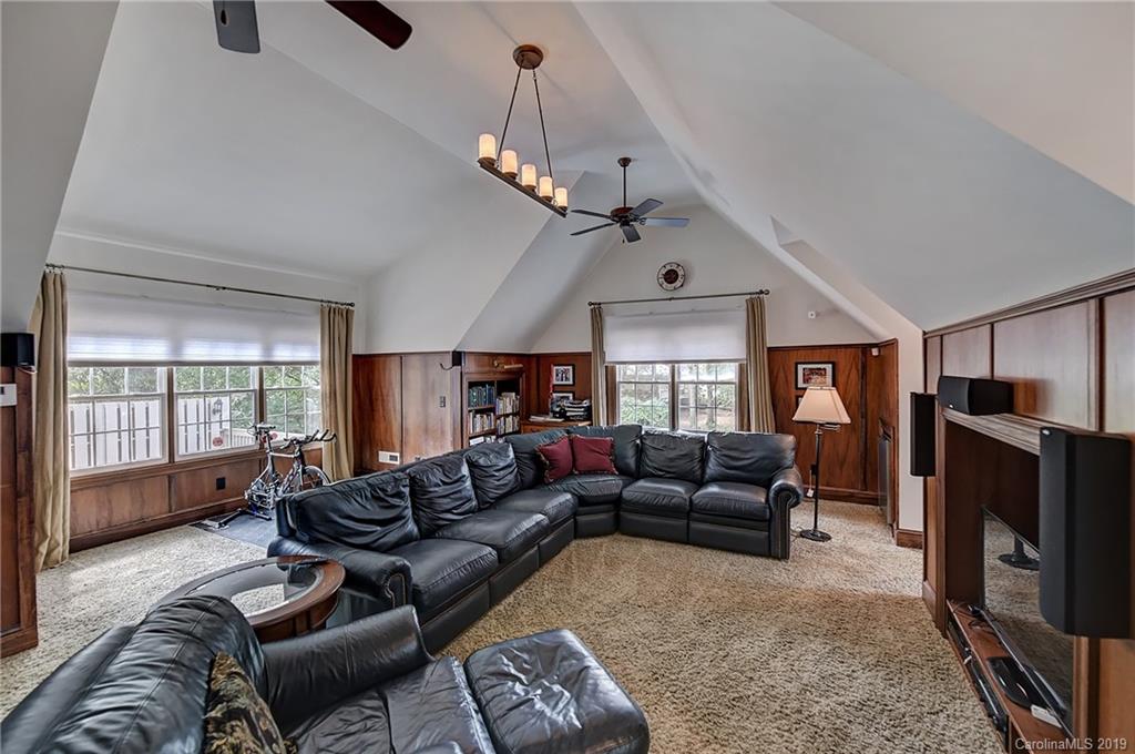 859 Museum Drive Charlotte, NC 28207 - Photo 21 of 23 a living room with furniture and a window