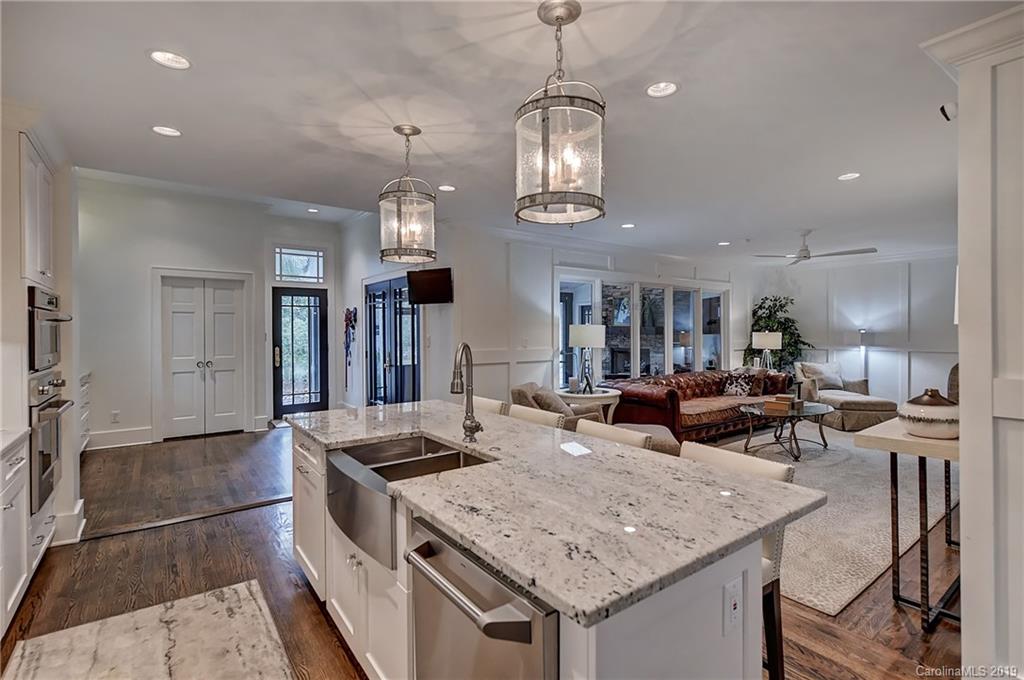 859 Museum Drive Charlotte, NC 28207 - Photo 9 of 23 a kitchen with stainless steel appliances granite countertop a sink stove and refrigerator