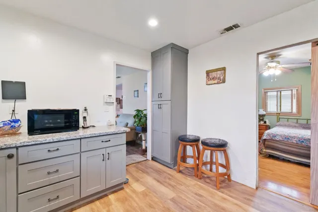 a bedroom with bed and tv