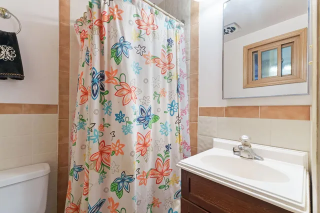 a view of a storage & utility room with washer and dryer