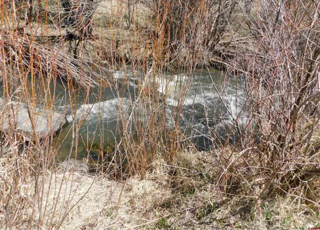 a view of a livingroom with a fireplace