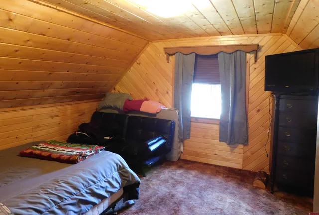 a room with furniture and a chandelier