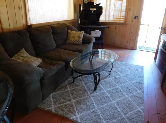 a bathroom with a toilet a sink and a mirror