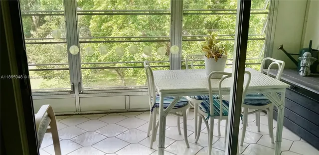 a view of lake with house and outdoor space