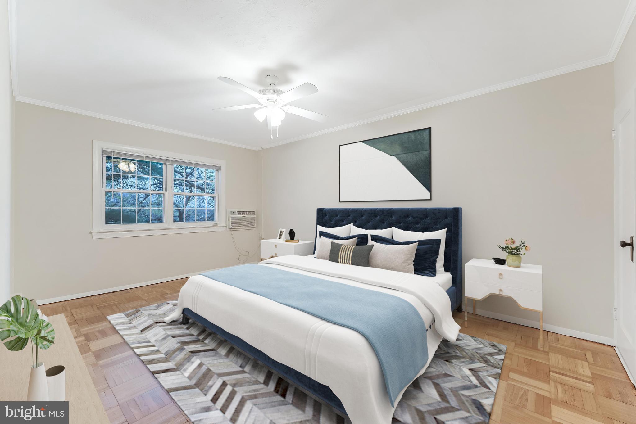 3228 Wellington Road Alexandria, VA 22302 - Photo 11 of 20 a bedroom with a large bed and a window