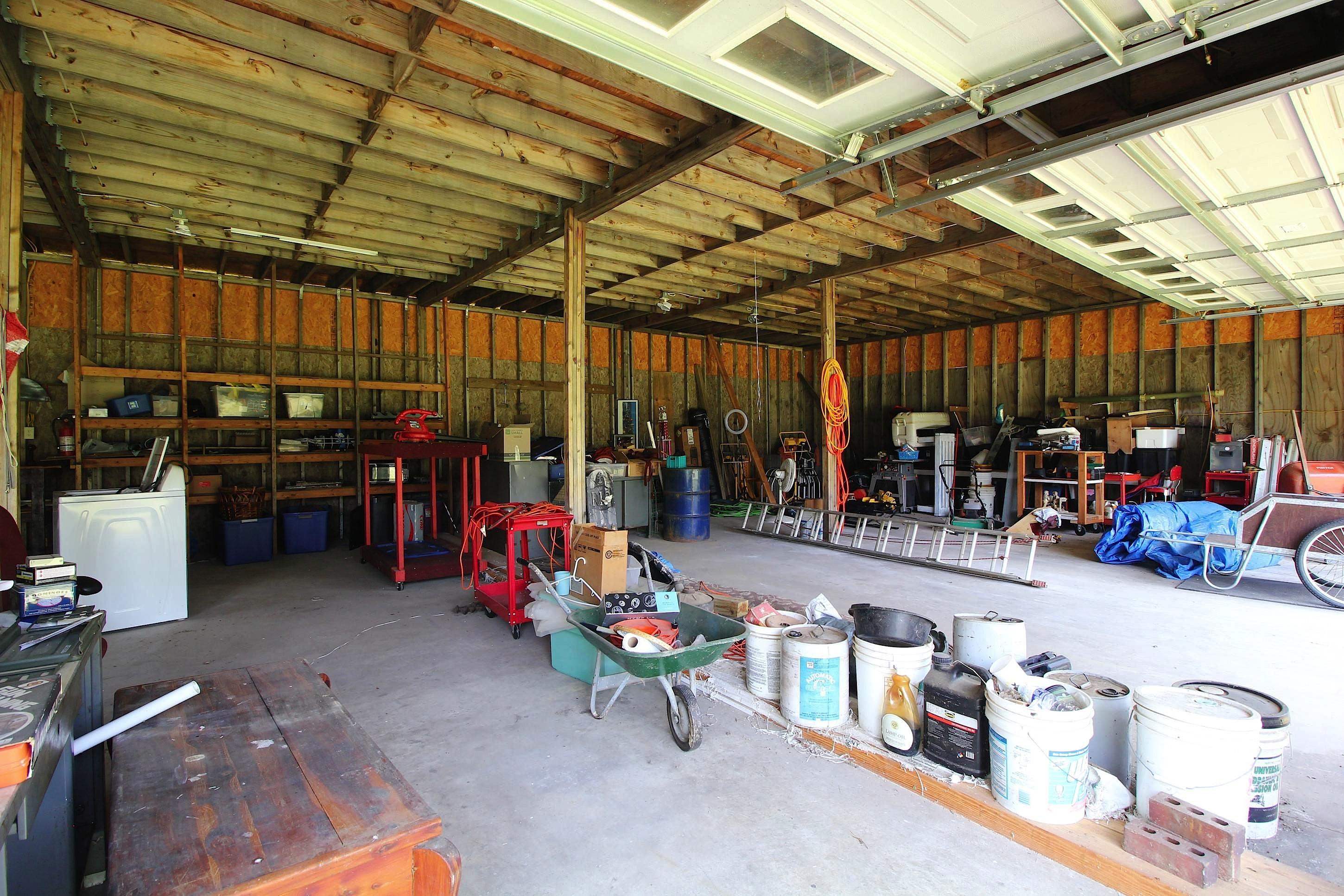 2550 North Reid Hooker Road Eads, TN 38028 - Photo 32 of 32 a view of a garage with a table and chairs