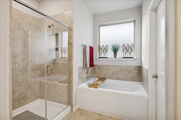 a view of a storage & utility room with washer and dryer